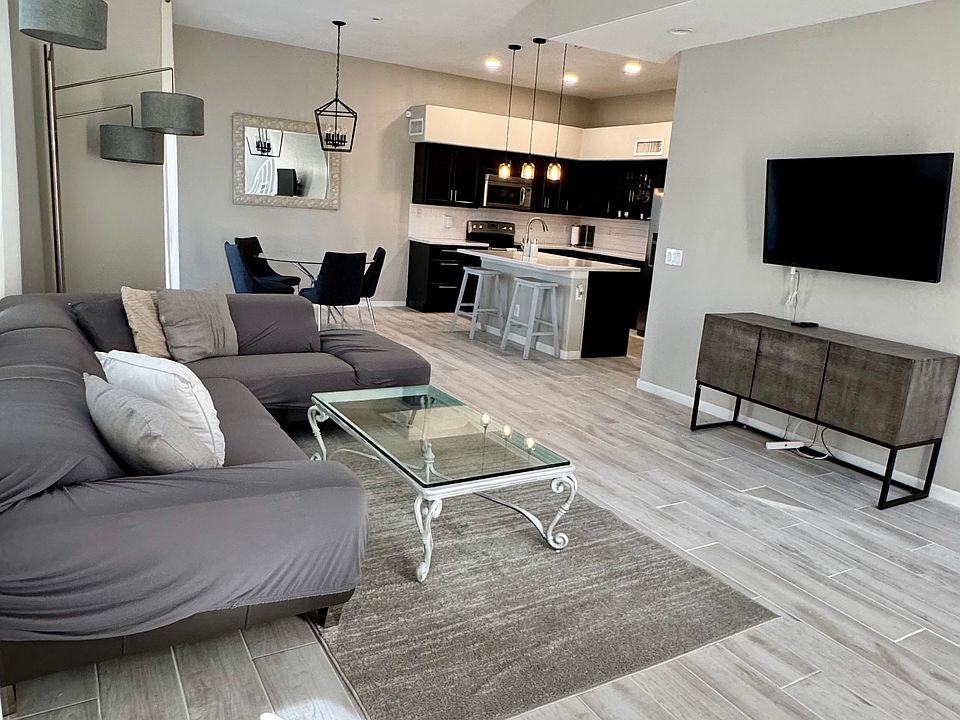 Living area, kitchen and dining area