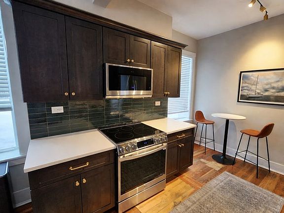 Kitchen view 1

Photos include virtual removal of furniture to better show room layout.