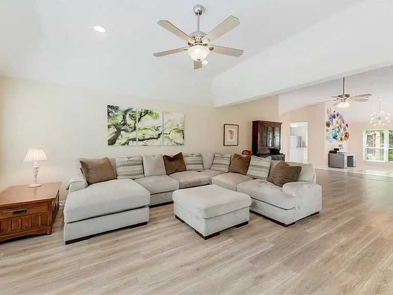 Large living room space with great lighting.