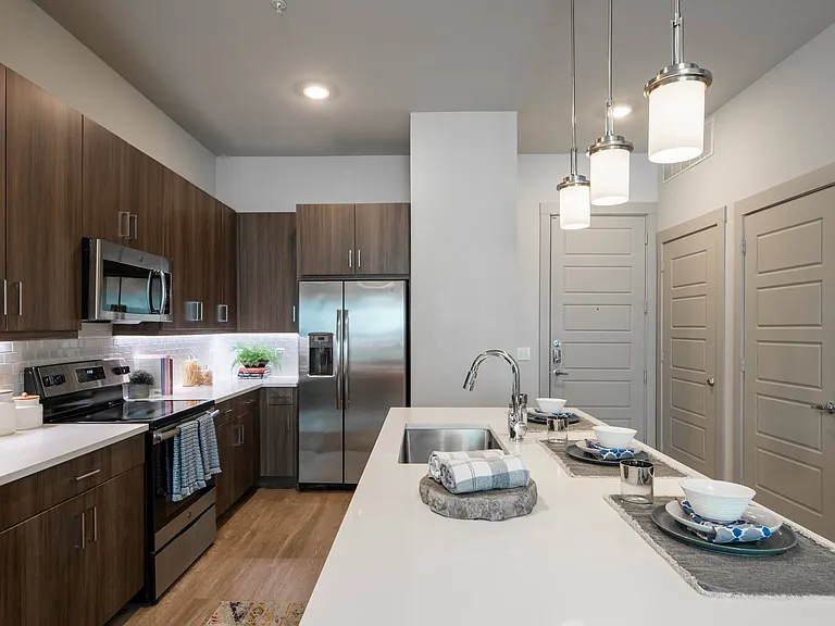 Modern Kitchen Featuring Breakfast Bar and Wood-Style Flooring