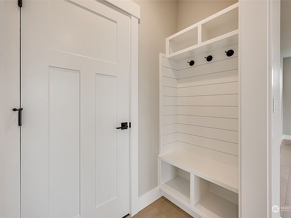 Owner's Entry / Boot Bench area - Entry Hall - Photos of another 2415 plan at Skyline. Color selections will vary.>