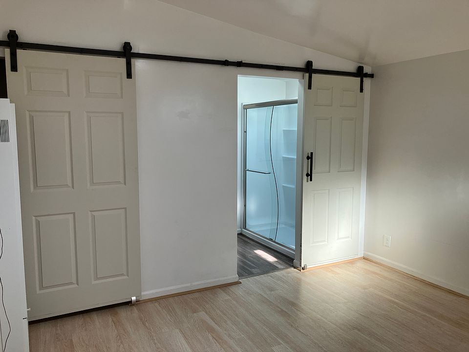 View toward bathroom from kitchen entry