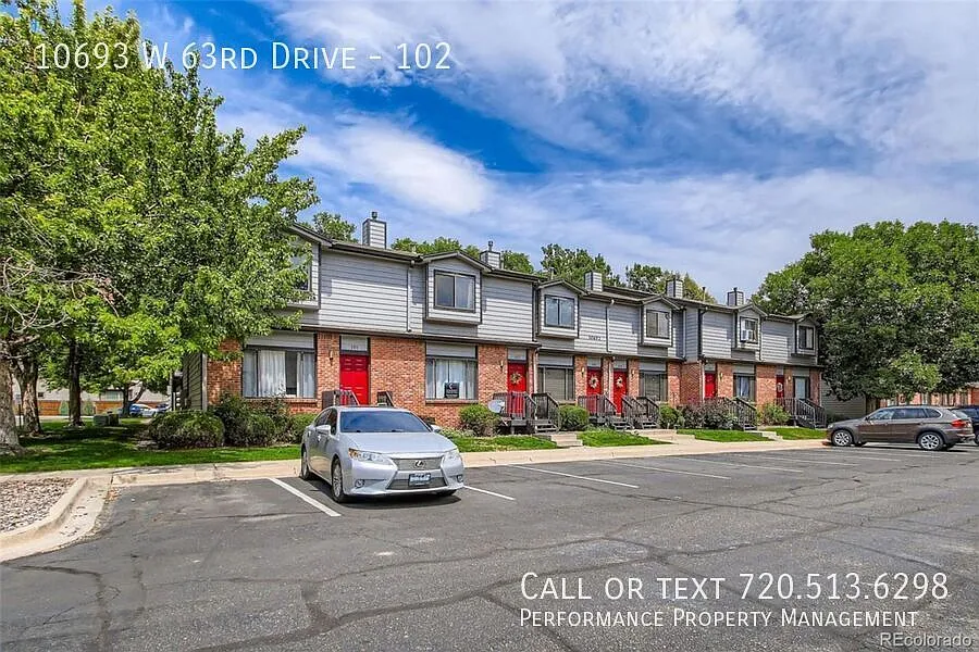 Building Photo - 10693 W 63rd Dr #102