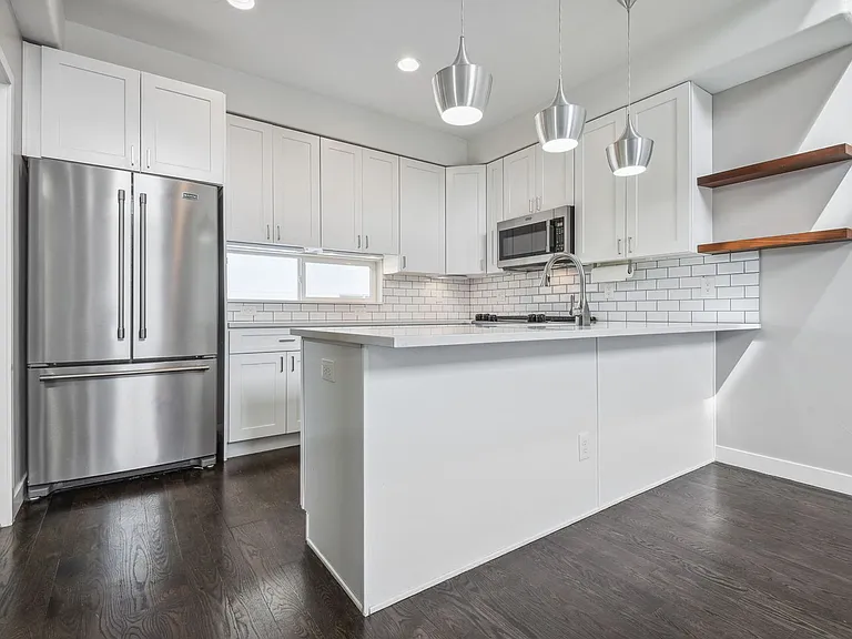 1551 W 43rd Ave — Photo 2