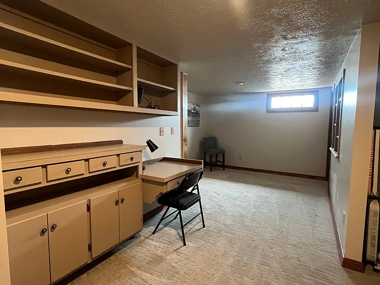 Basement has built in desk