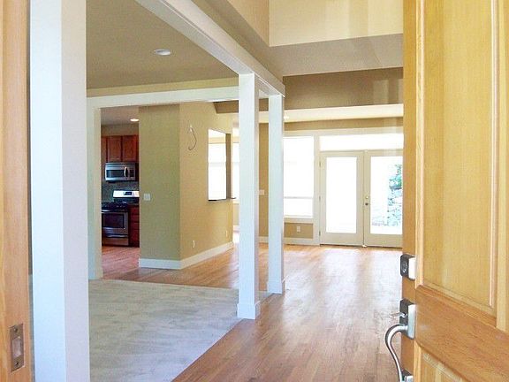 Two story entry with wide plank hardwoods