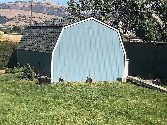Shed containing well
