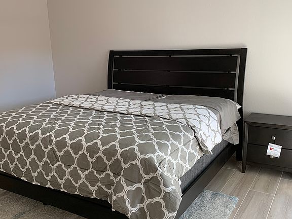Primary bedroom with walk-in closet and bath.