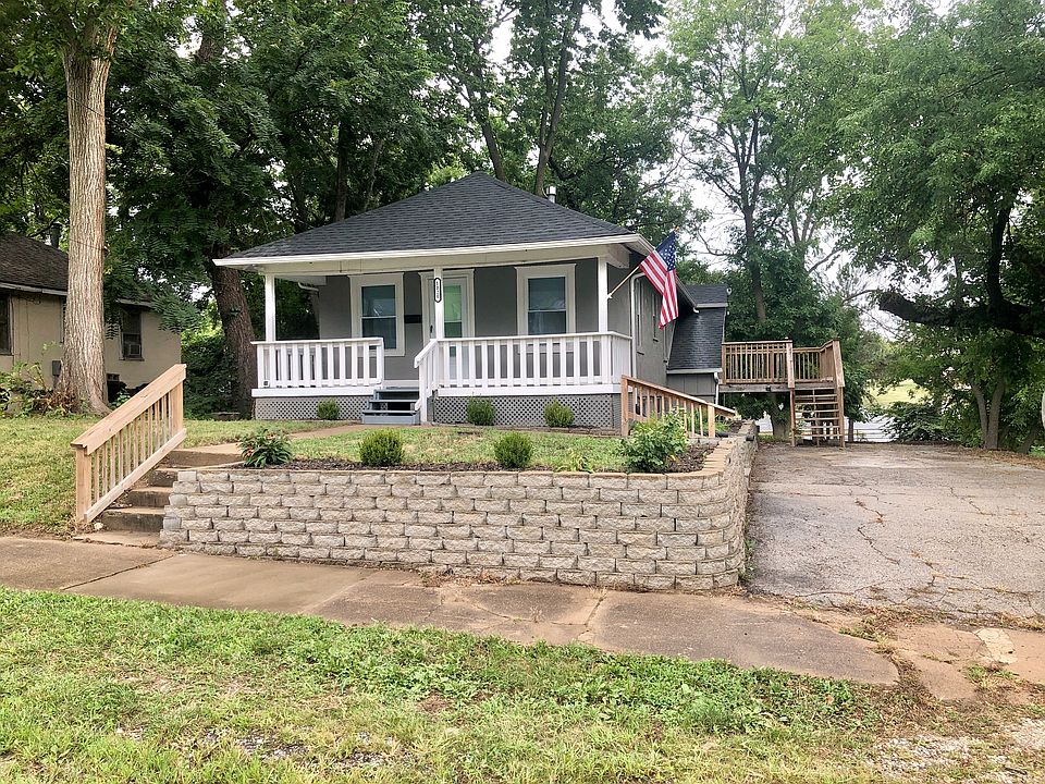 Cute little bungalow with wide double driveway for off the street parking.