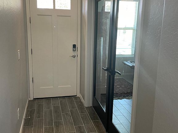 French doors added for an optional Den or 4th Bedroom.