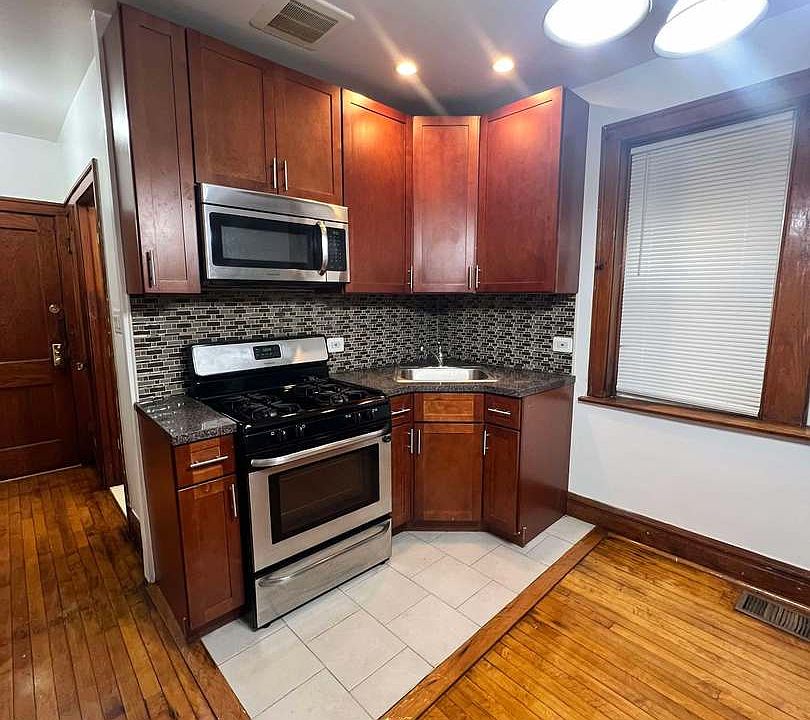 1st image of 7022 S Maplewood Ave #1R