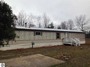 6025 Harper Rd NW, Rapid City, MI 49676