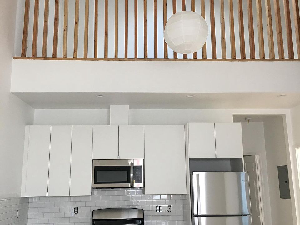 Kitchen and loft above