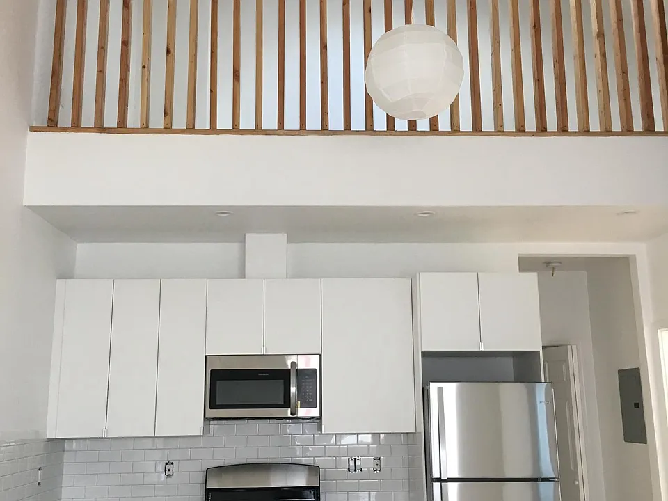 Kitchen and loft above