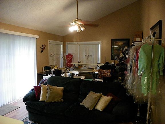 Kitchen opens to Family Room, being used as a knitting room