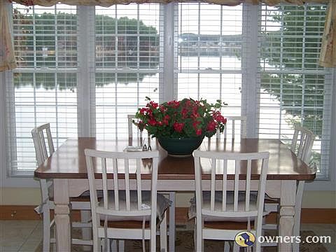 Sunroom off kitchen with skylights and deck access