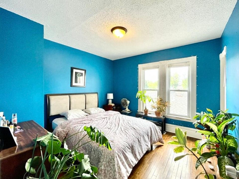 Bedroom 1 is currently painted white