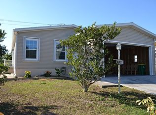1027 Wren Cir, Barefoot Bay, FL 32976