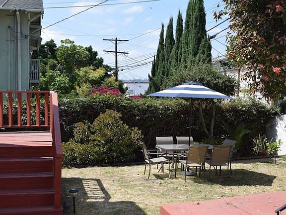 Yard is much greener now!! ....these 4 wooden stairs are the entry point to the studio!