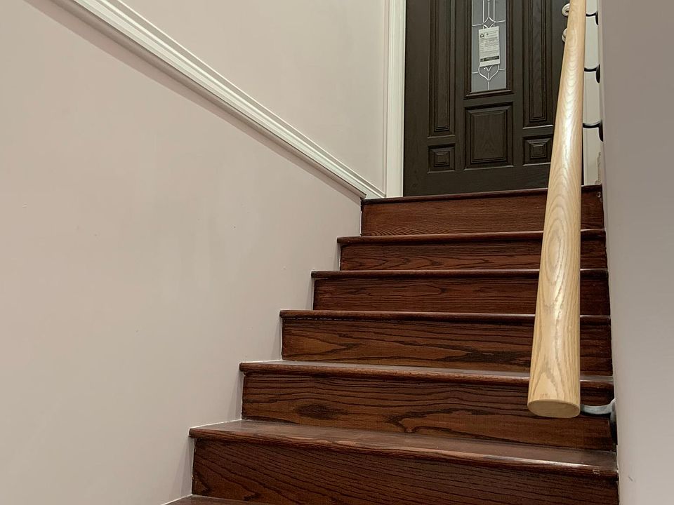Stairs leading down to Unit G from front door