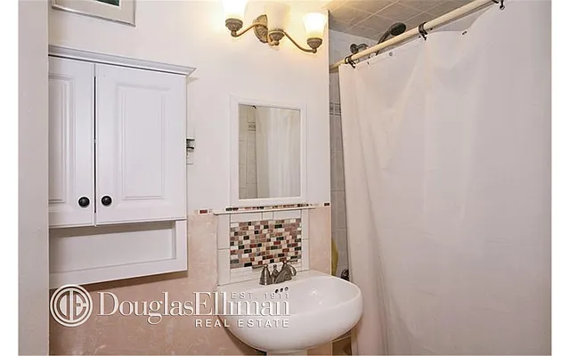 Sold by Douglas Elliman | media 16