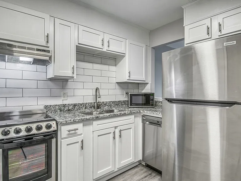 Village Green Apartment Homes — Photo 10