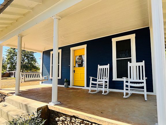 The front porch is perfect for coffee in the morning and a glass of wine at night!