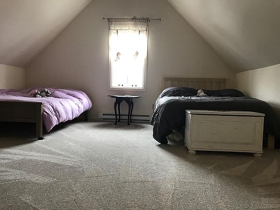 large bedroom roomy enough for two large queen beds as you s