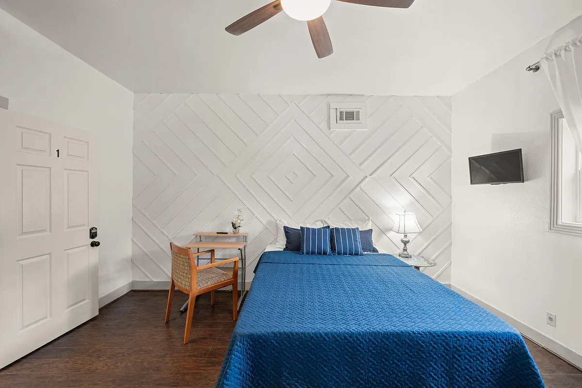 Queen-sized mattress, 24" HD TV, and a l - N York St