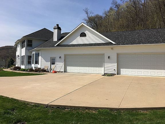 5+ garage + large drive way.