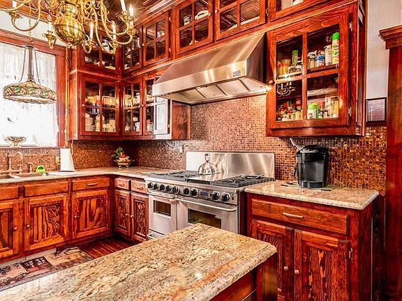 Vintage Cooper Stamped Ceiling with Cooper Sink and 3 oven "shared kitchen. "