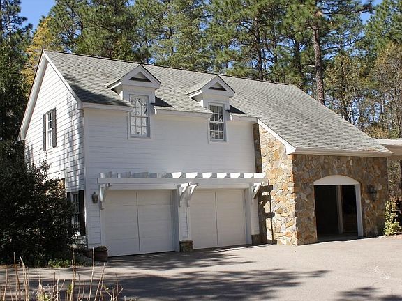 Two car garage with carport
