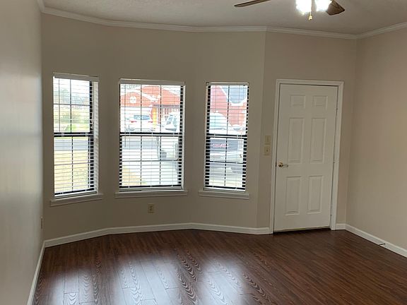Open concept living room, dining, and kitchen