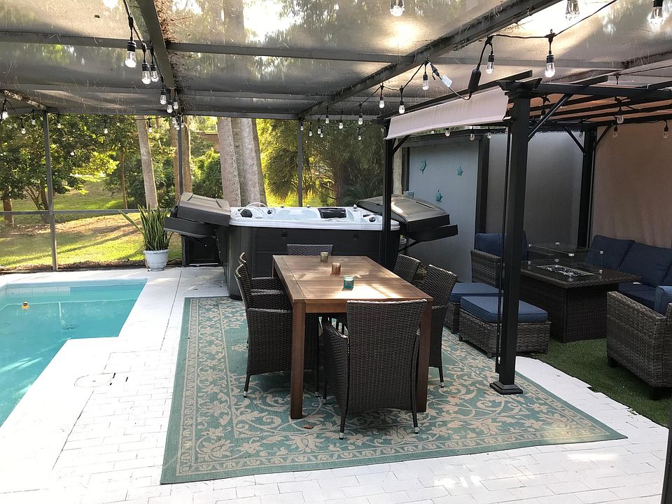 Fully Screened Private Patio with Small Pool, Dining Area, Hot Tub, and Conversation Area