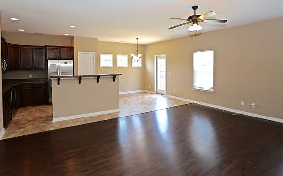 Looking at kitchen from living room. To the right is the din
