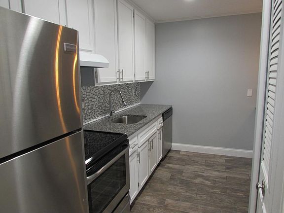 Updated kitchen w/ granite and SS appliances