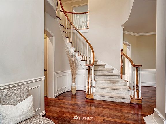 Gorgeous Hardwood Floors Throughout The Main Floor + Grand Staircase. Central Air Conditioning Throughout The Home.