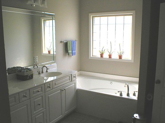 Large Master Bathroom with jetted tub and separate shower.