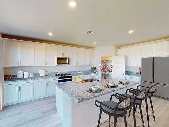 Residence 2 kitchen modeled at a nearby Meritage community.