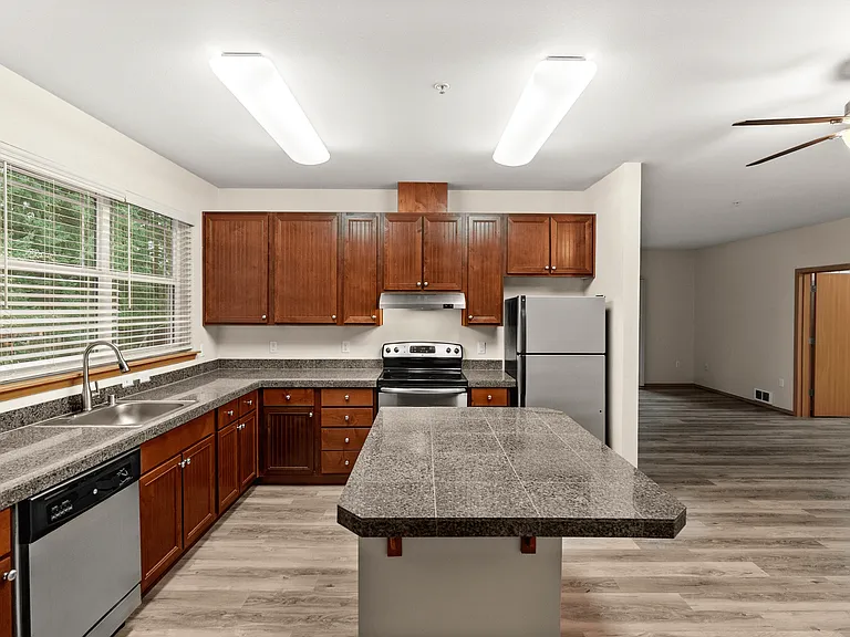 Modern kitchen with stainless steel appliances, generous counter space, and an open layout perfect for everyday living. Modern kitchen with stainless steel appliances, generous counter space, and an open layout perfect for everyday living.