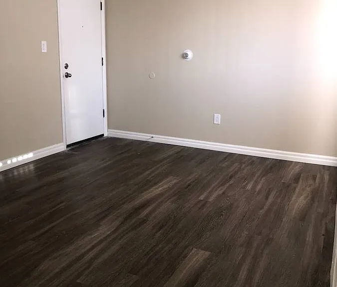 Explore this elegant space with sleek wood flooring and a touch of modern minimalism. Explore this elegant space with sleek wood flooring and a touch of modern minimalism.