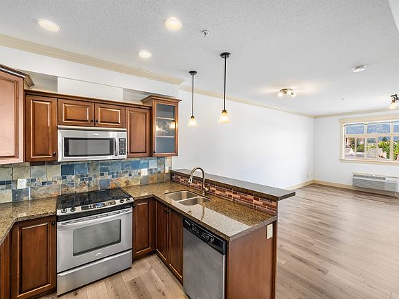 2nd image of 45893 Chesterfield Ave #307