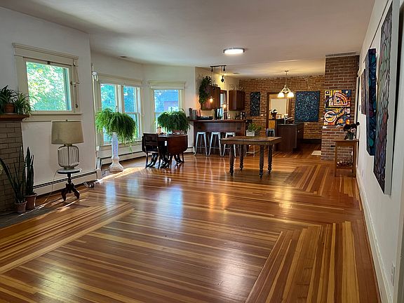 Beautifully detailed hardwood floor with an open floor plan perfect for entertaining.