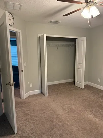 upstairs bedroom # 3 - back of house
blinds and ceiling fans included