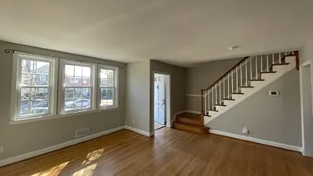 Living Room with First Floor Stairs