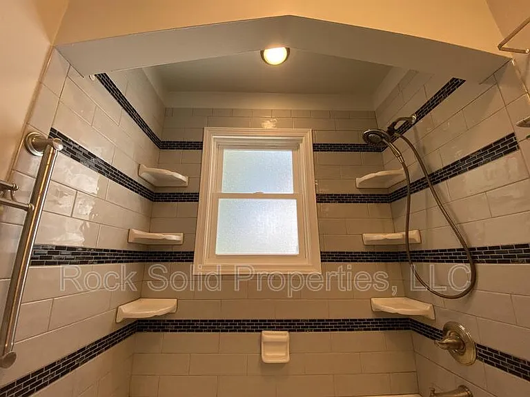 416 E 3rd St — Photo 19