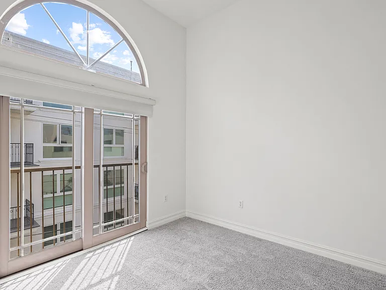 Bedroom with Balcony and Double Doors