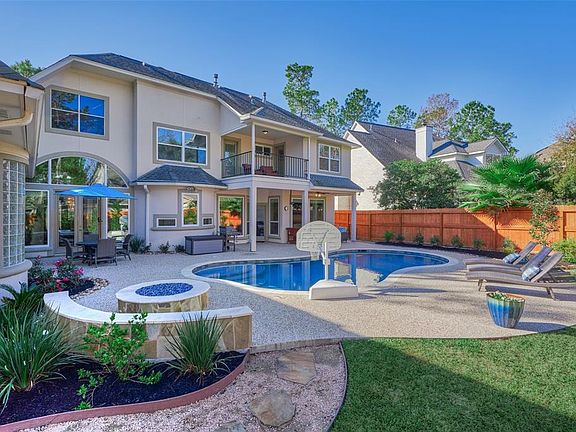 The breathtaking backyard Oasis! Current owners just completed the new heated pool, new fence, built in fire pit and all new landscaping! it is GORGEOUS!!!..