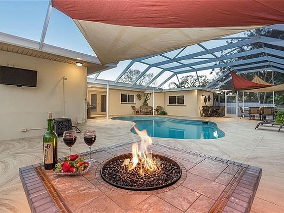 Large screened pool lanai.  Ample space for many entertaining areas.  Home is fenced and landscaped for privacy.