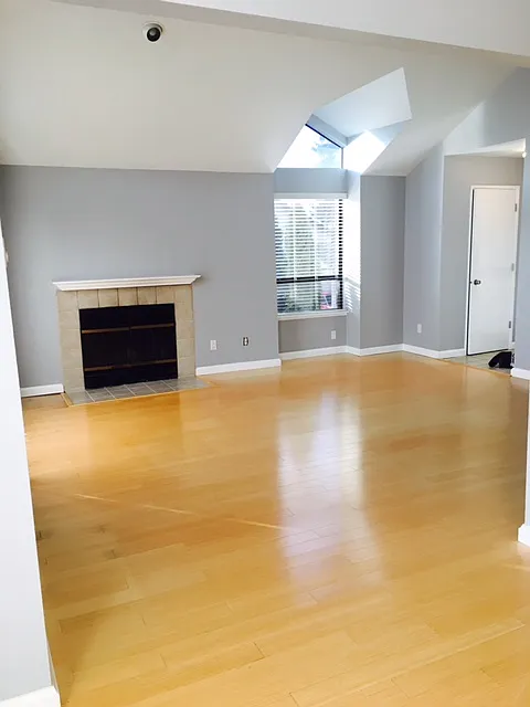 Hard wood Family Room with Fire PLace